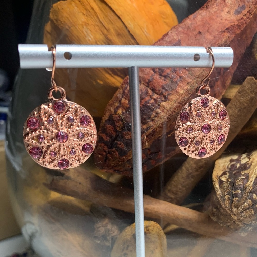Rose Gold colored earrings w/ magenta rhinestones